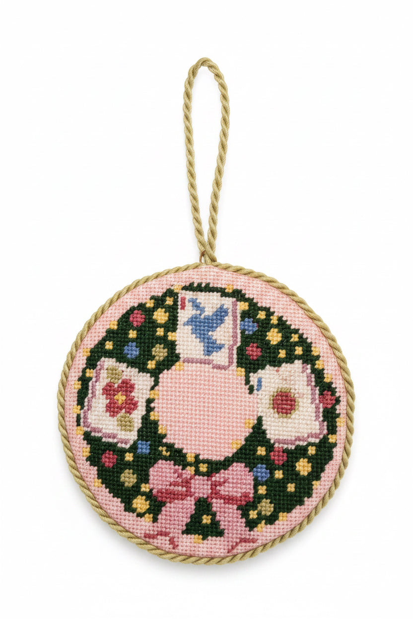  "Handcrafted needlepoint mahjong wreath ornament with vibrant tile motifs in red, pink, green, and gold"